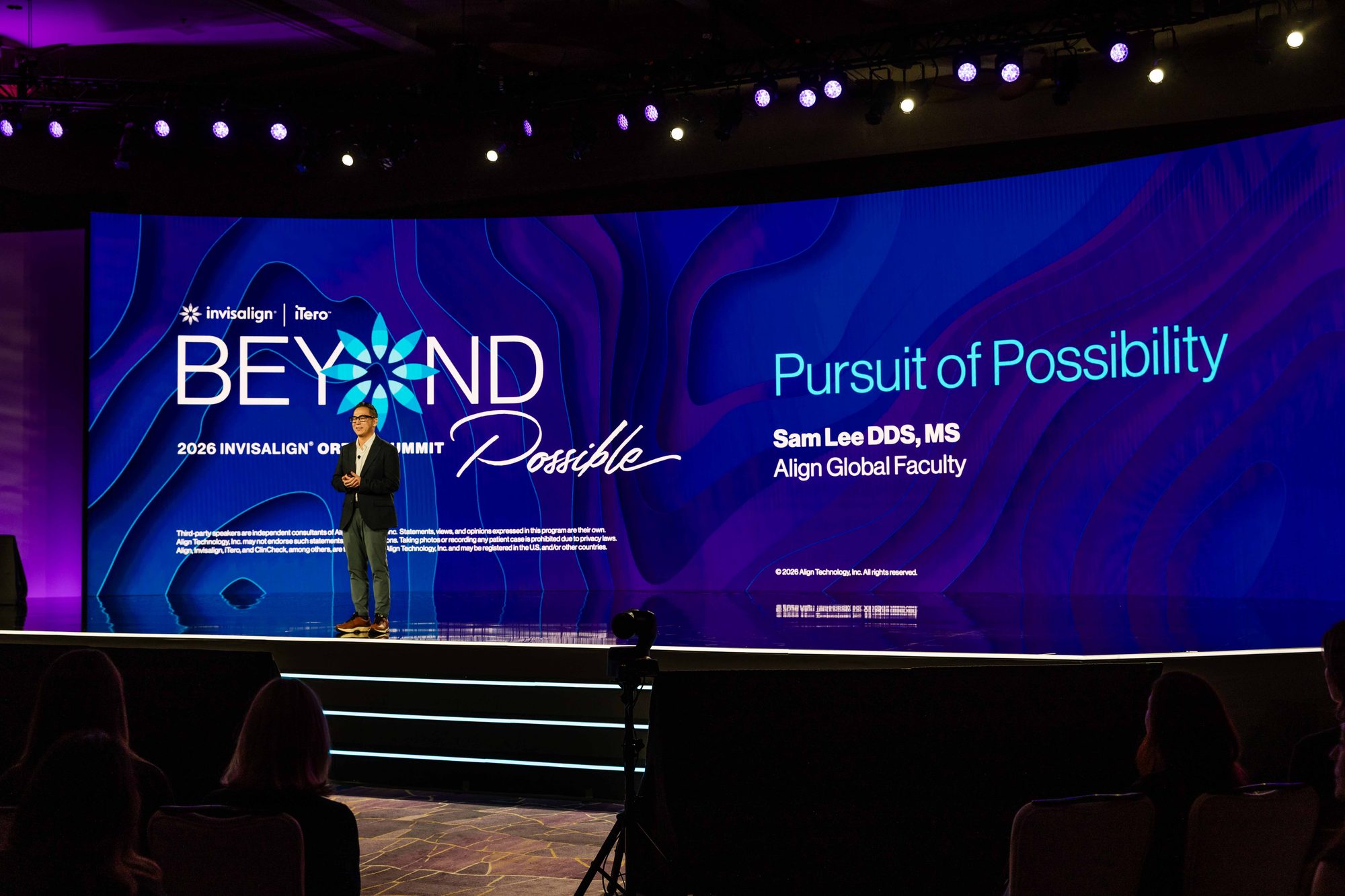 Wide shot of Dr. Sam Lee on stage, Beyond Possible, 2026 Invisalign Ortho Summit